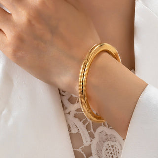 Gold-Tone Flexible Coil Bangle-JOSSLYN by wall to wall-80B1714-The Twisted Chandelier